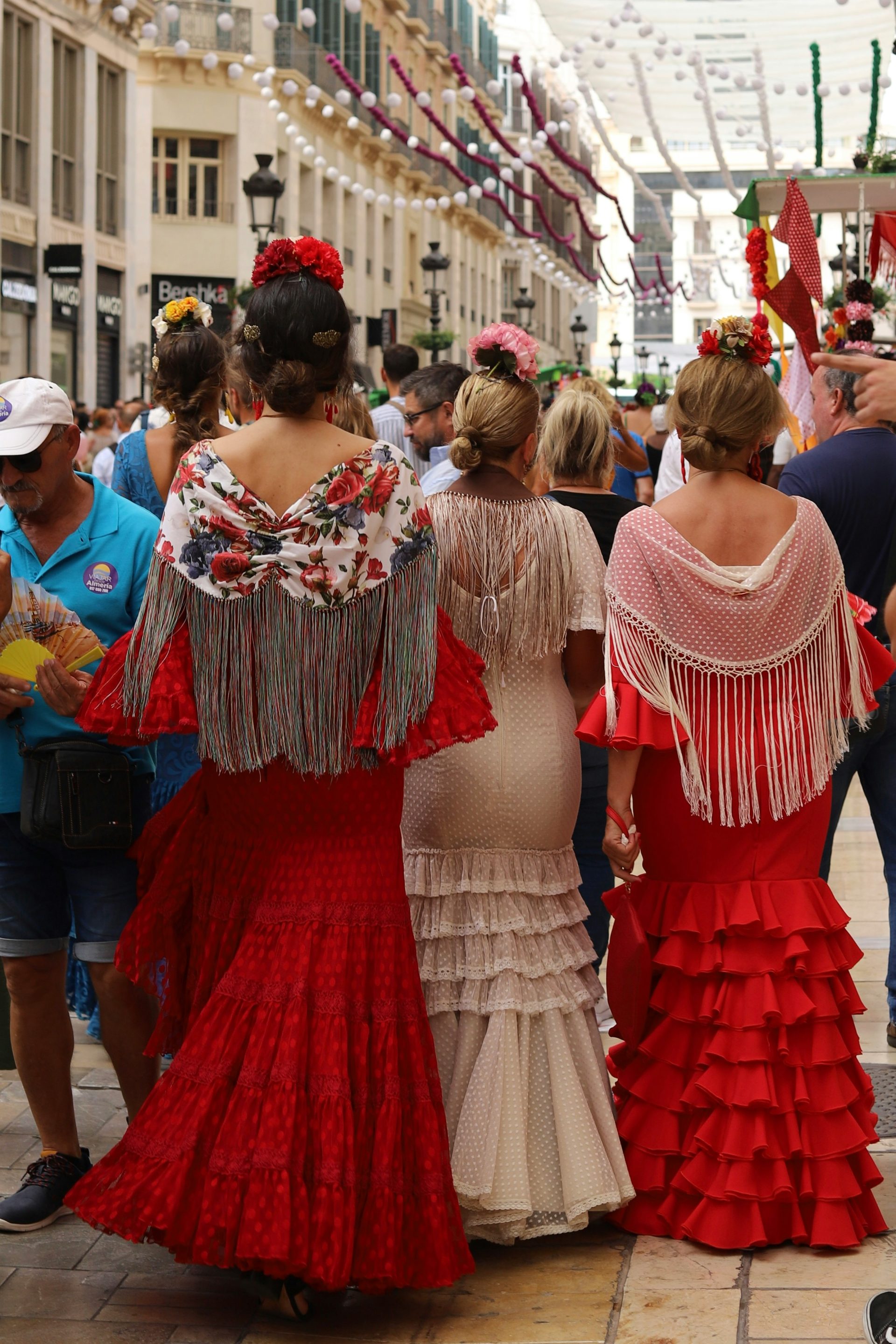 a group of people in dresses
